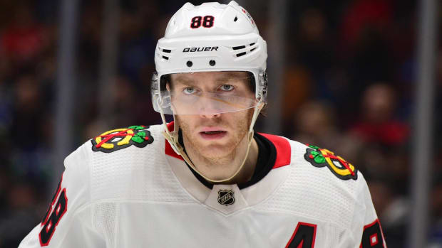 Blackhawks forward Patrick Kane looks on during a game vs. teh Canucks.